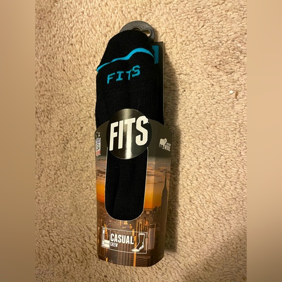 Brand new in packaging FITS crew socks. Merino wool.